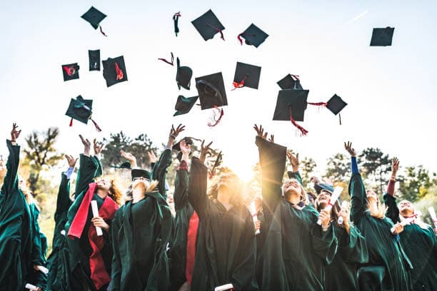 Students celebrating graduation